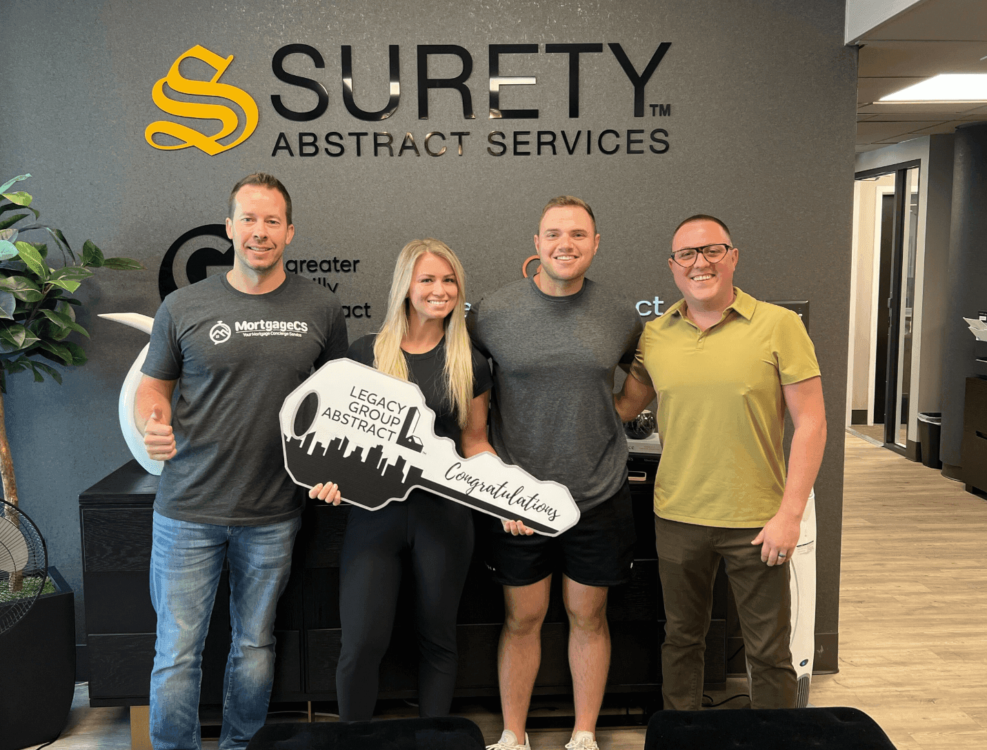 Professional discussing mortgage refinance options with clients