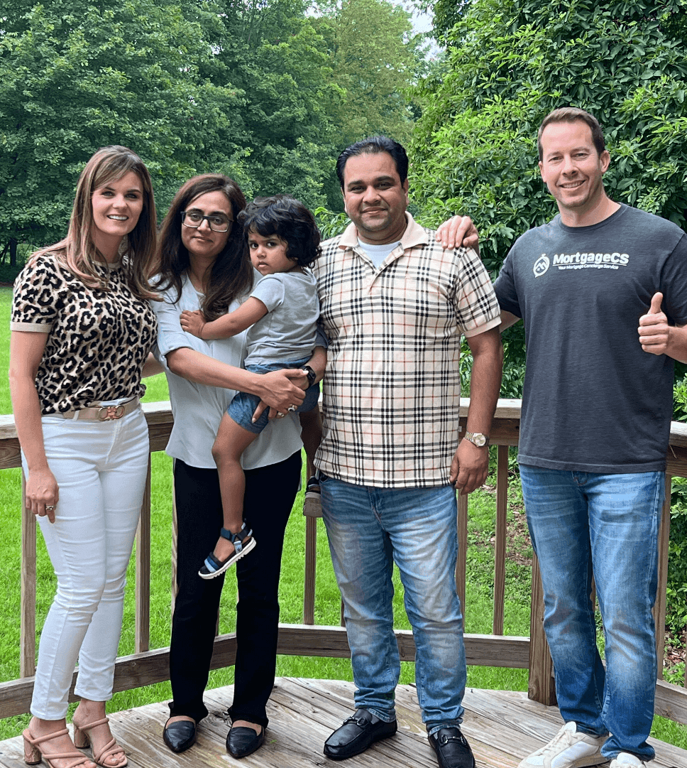 First-time home buyer reviewing mortgage documents with satisfaction